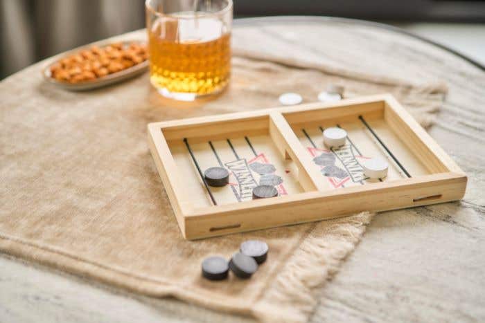 Gioco di espulsione in legno Rio